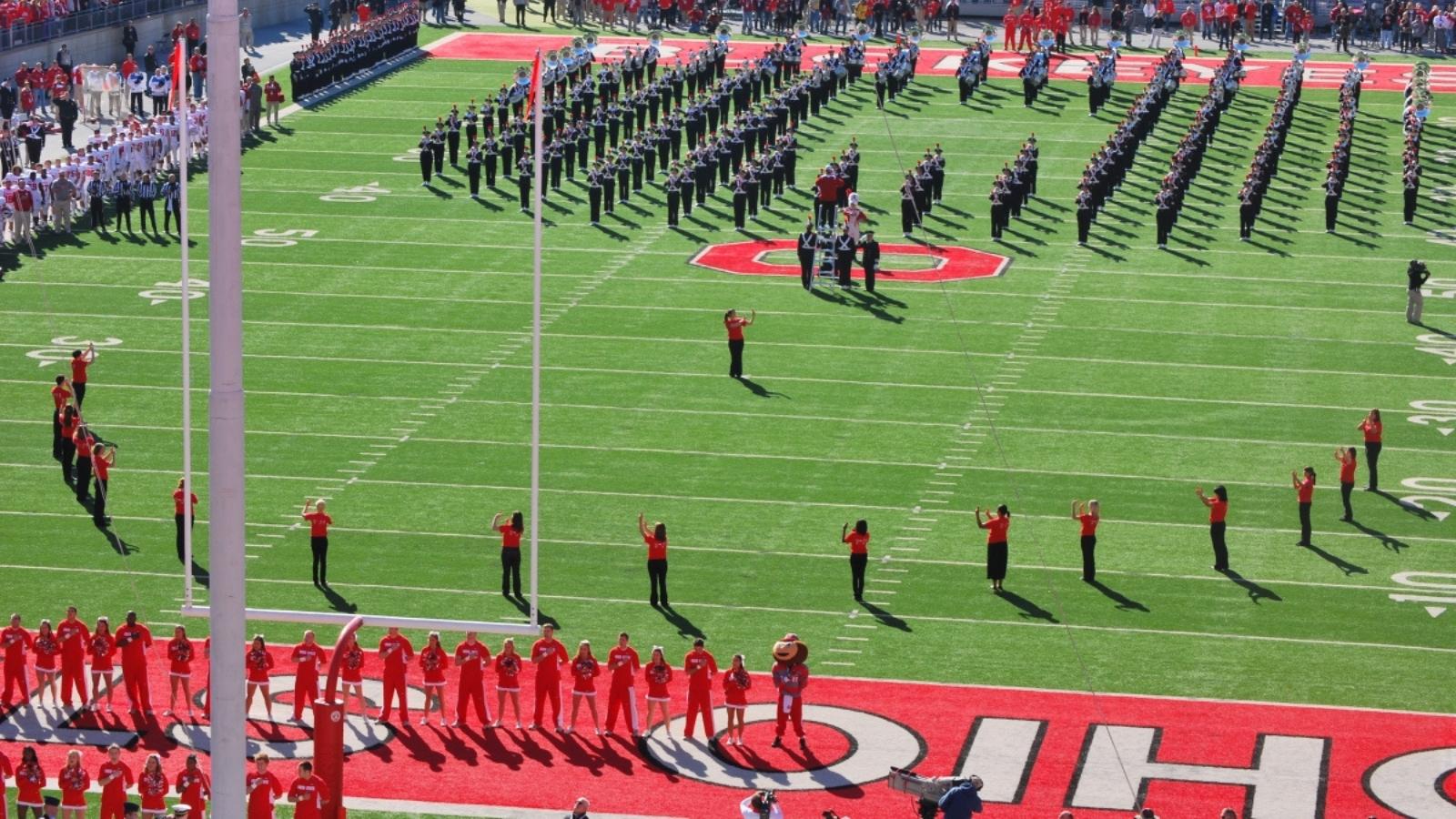 ASL students sign the National Anthem at an OSU football game