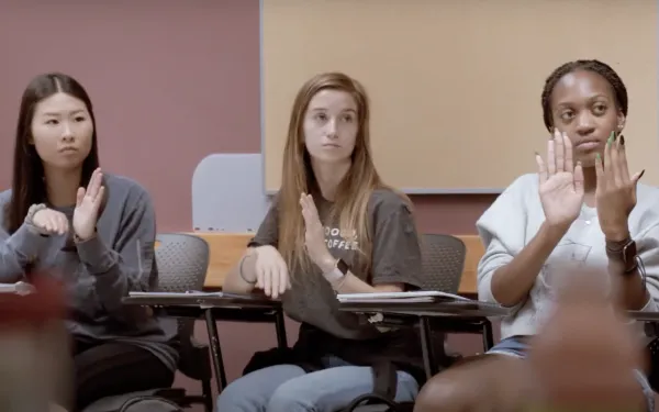 Students signing in an ASL class