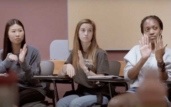 Students signing in an ASL class