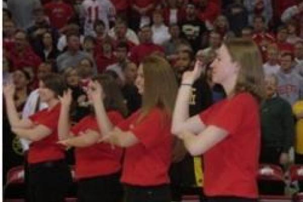 Signing at the basketball game